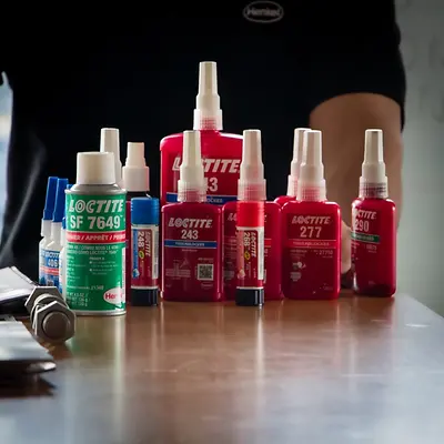 Several bottles of adhesives and sealants
