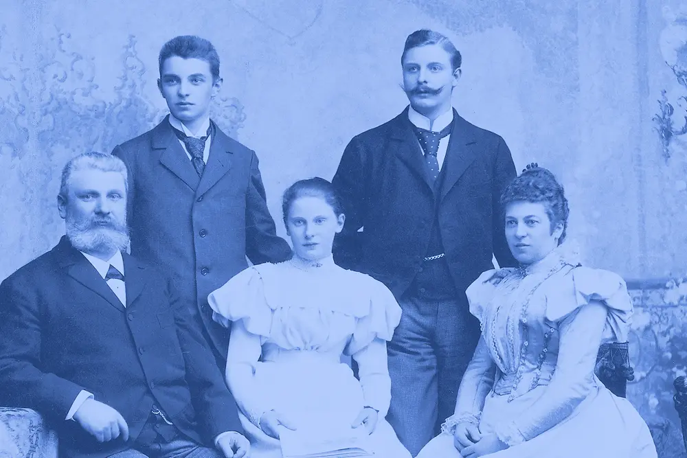 Collage of vintage Henkel products, detergent bottles, lab workers, and historical advertisements in blue tones.