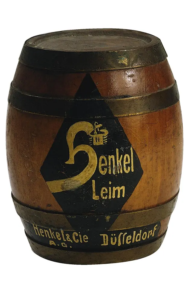 Miniature replica of a printed Henkel glue drum from 1925.